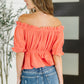 Don’t Be Shy off-the-shoulder blouse with ruffled sleeves and gathered waistband