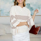 Cream-colored White Birch hoodie with taupe stripes and bell sleeves