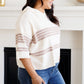 Cream-colored White Birch knit hoodie with taupe stripes and ribbed hem