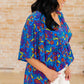 Dreamer Peplum Top in Royal and Red Abstract Tops