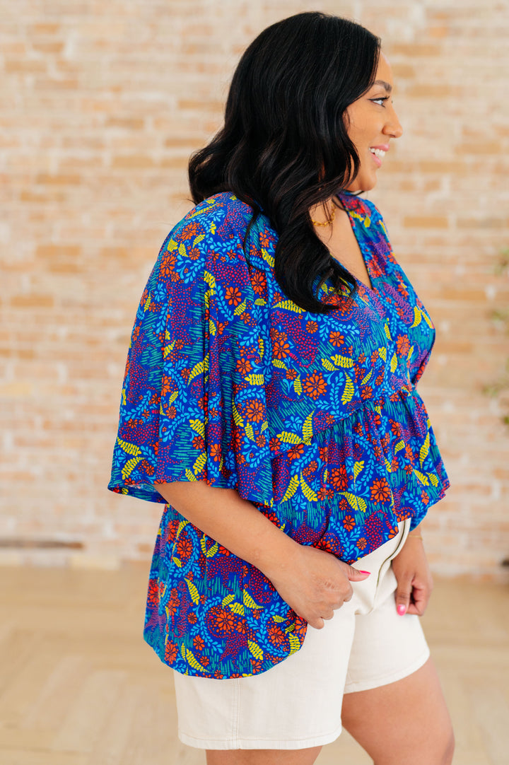 Dreamer Peplum Top in Royal and Red Abstract Tops