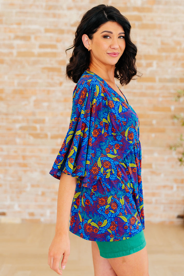Dreamer Peplum Top in Royal and Red Abstract Tops