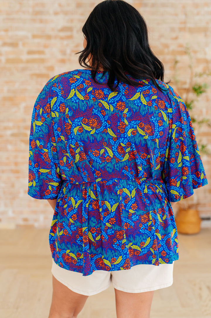 Dreamer Peplum Top in Royal and Red Abstract Tops
