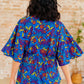 Dreamer Peplum Top in Royal and Red Abstract Tops
