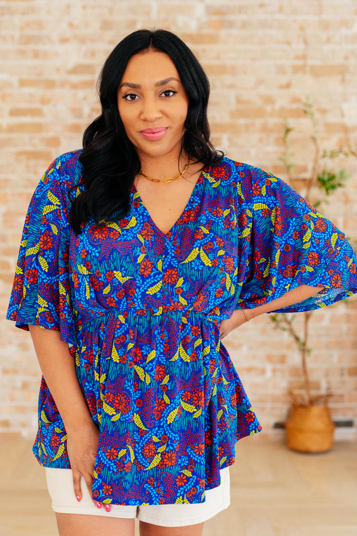 Dreamer Peplum Top in Royal and Red Abstract Tops