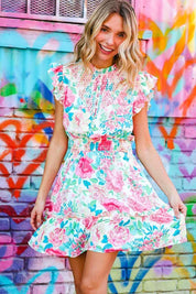 Under Your Spell Floral Smocked Flutter Sleeve Ruffle Mini Dress | Daverri Fashions