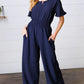 Dark Blue Smocked Waist Notch Neck Crepe Jumpsuit - DAVERRI FASHIONS
