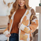 Rust Lotta Love knitted sweater top with cream orange heart pattern