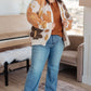 Plus size model in brown and cream Lotta Love floral fur-trim sweater