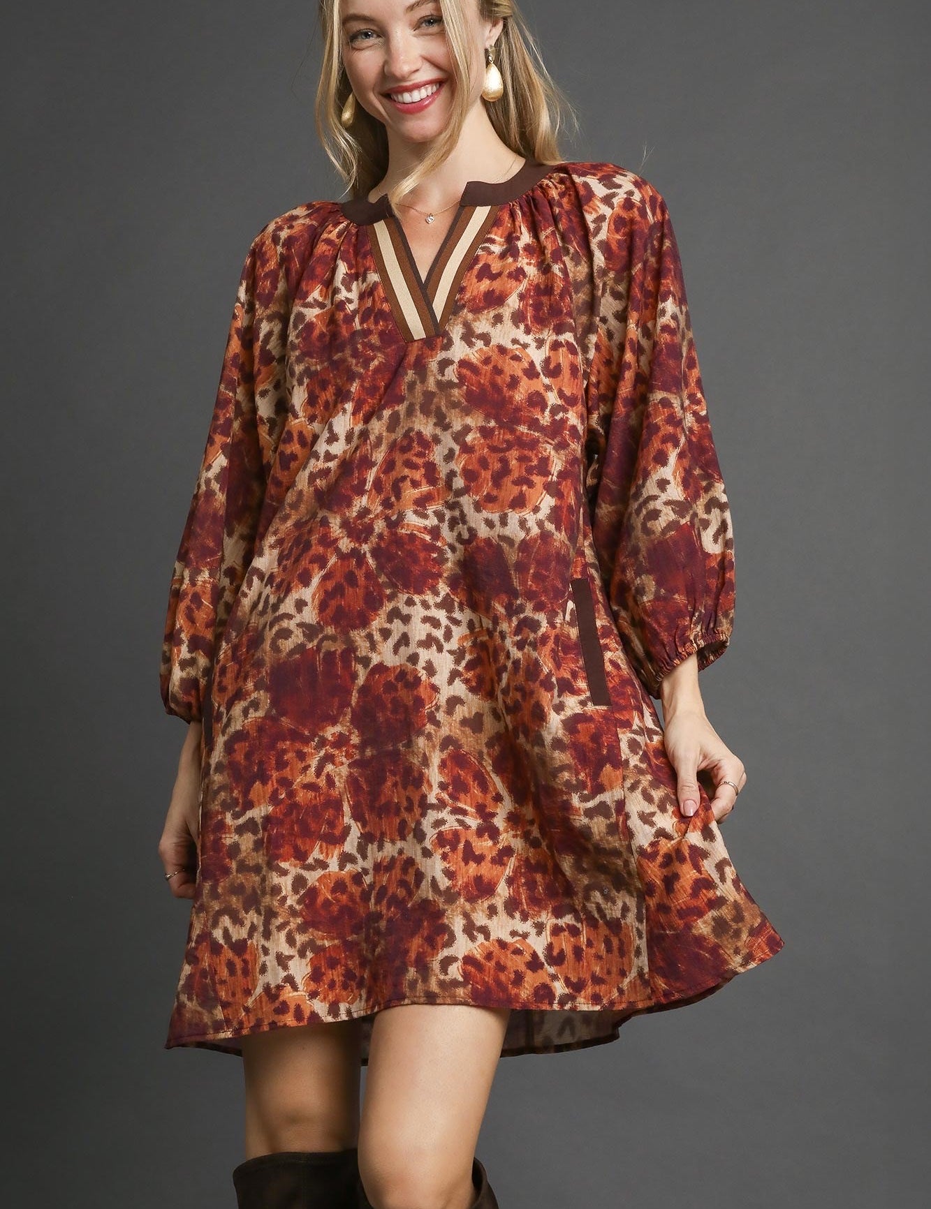 Umgee boho tunic dress in floral animal print with earthy tones and trim