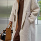 Plus size cream shearling turtleneck coat with tan leather accents