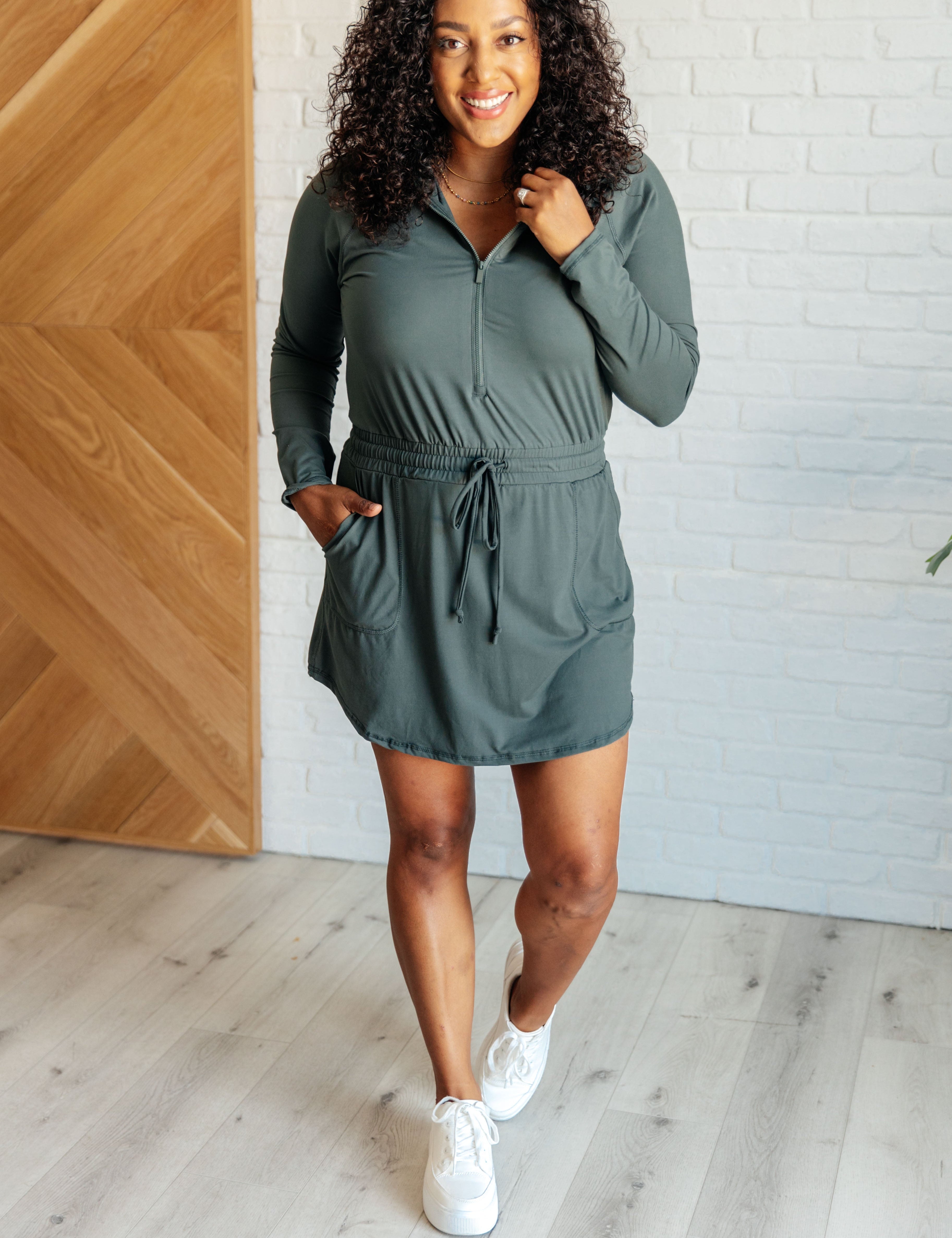 Getting Out Long Sleeve Hoodie Romper in Smoked Spruce Jumpsuits & Rompers