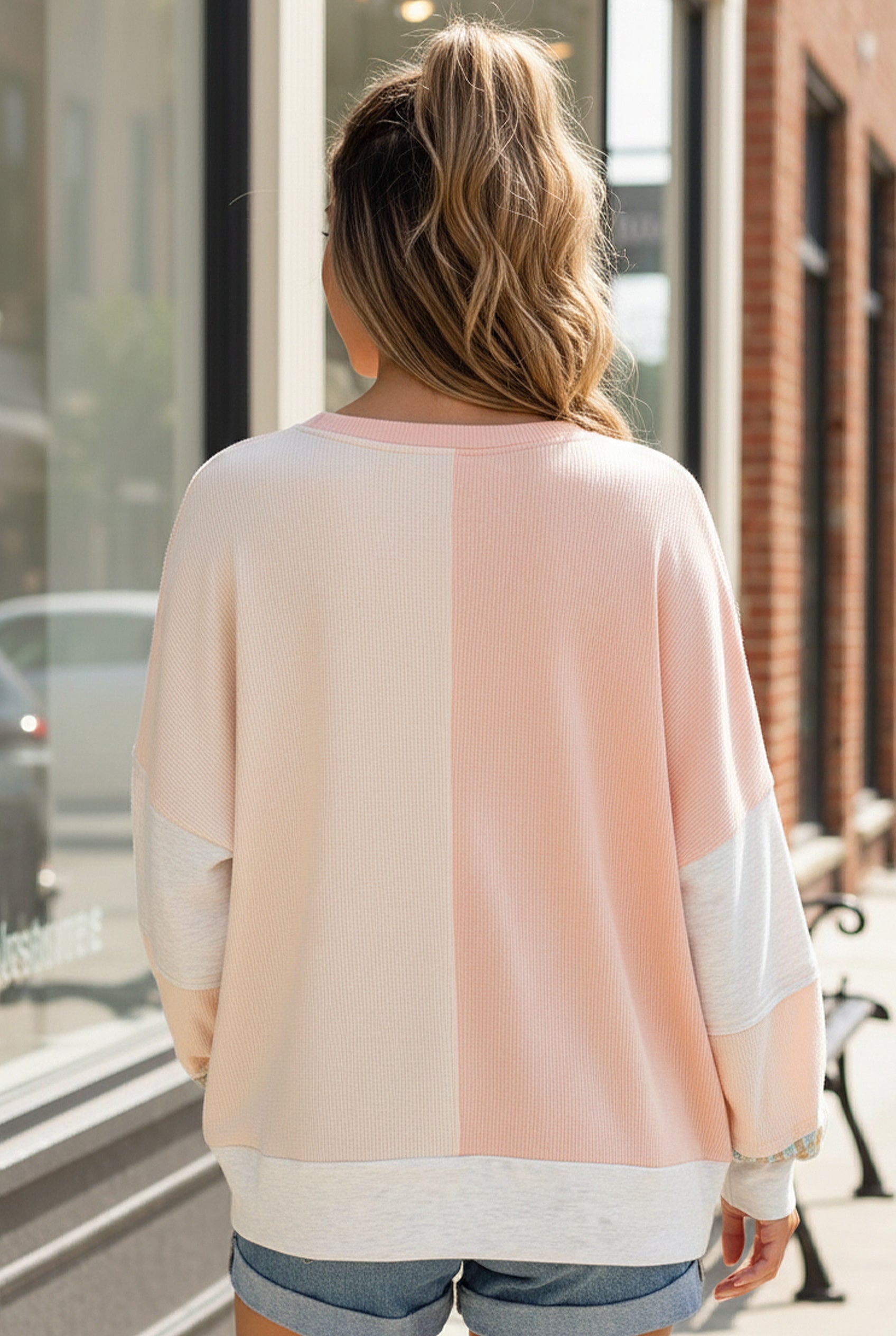 Soft pastel pink and white Sunday Peach Patchwork knit sweater