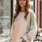 Pastel pink and white patchwork sweatshirt with plaid sleeves