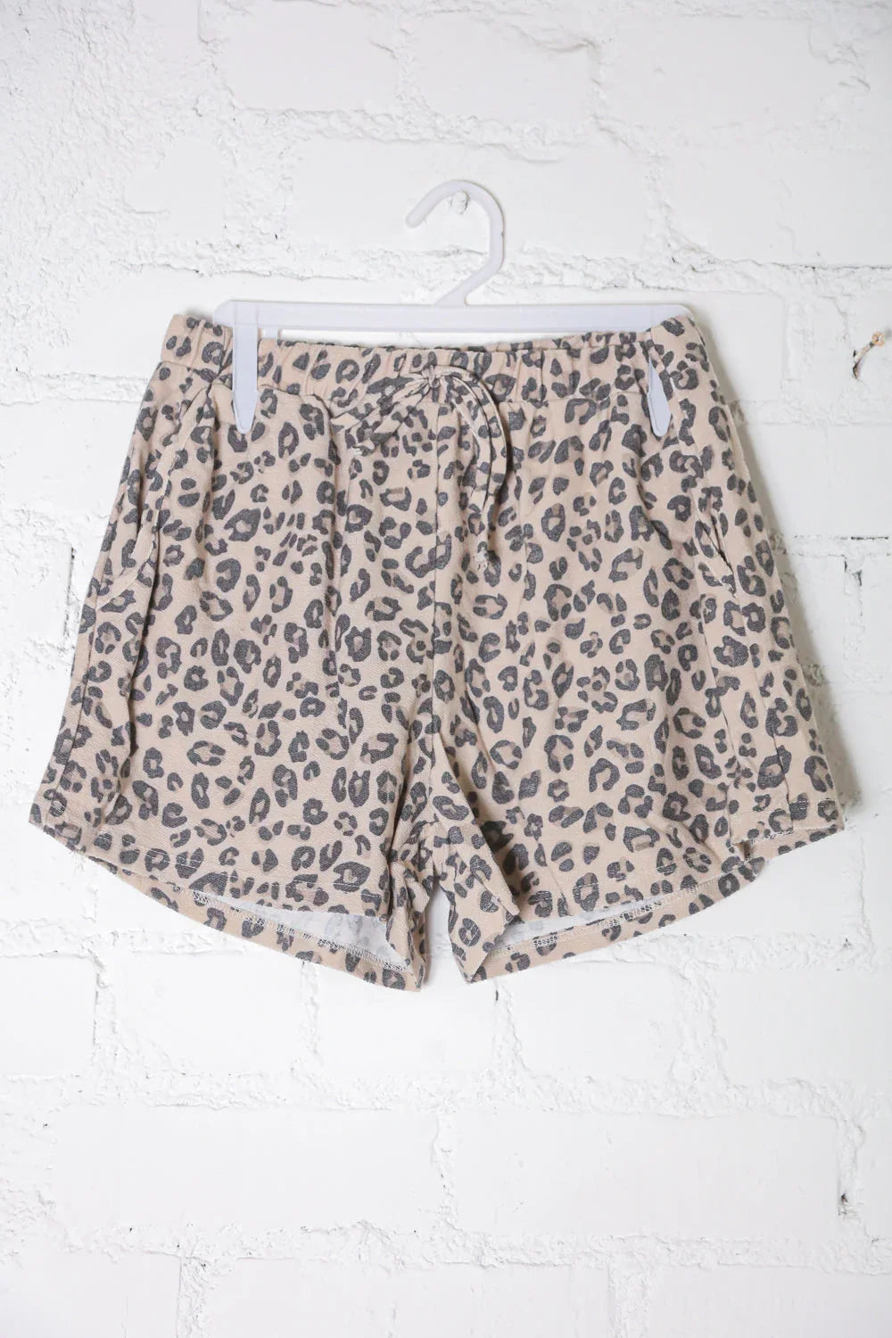 Be Bold Taupe Animal Print French Terry Pocket Shorts | Daverri Fashions
