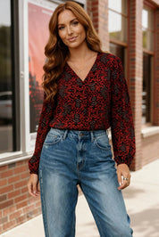 Red and black Tangerine Blooms floral V-neck blouse with long sleeves