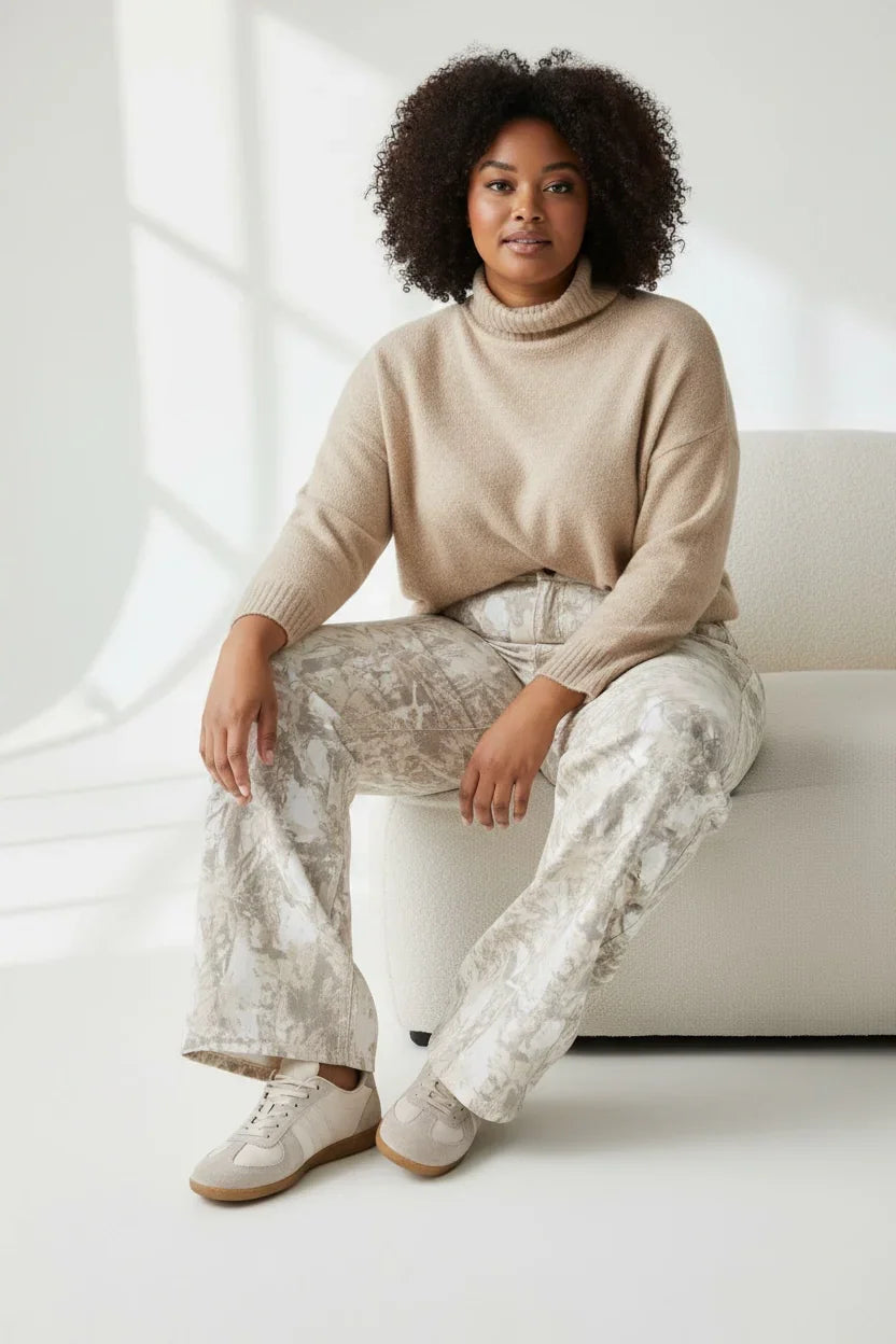 Beige turtleneck sweater paired with Seige Denim plus size jeans