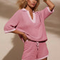 Women’s pink striped knit V-neck top and matching shorts set