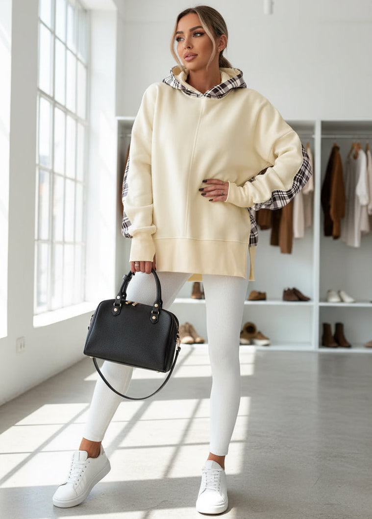 Black leather handbag with silver-tone hardware and a structured, rounded shape.
