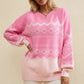 Women’s pink oversized geometric knit sweater with long sleeves