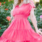 Vibrant pink women’s smocked V-neck cap sleeve mini dress with ruffled hem