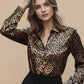 Sleek leopard-print button-up long sleeve shirt with satin sheen