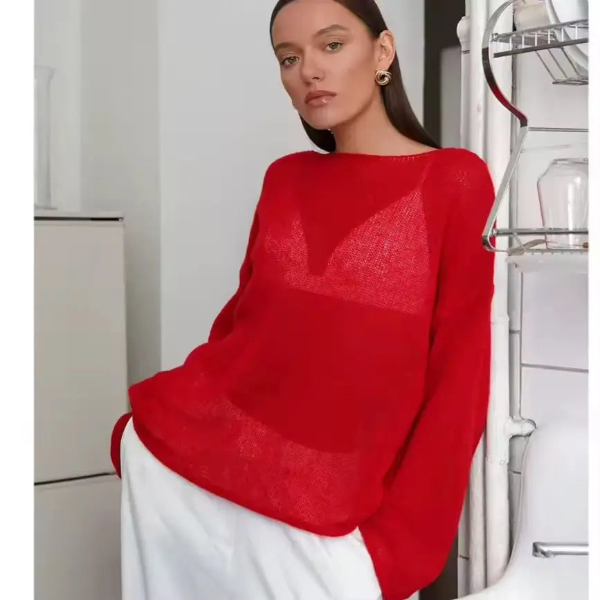 Vibrant red boat neck dropped shoulder knit sweater with sheer mesh chest panel