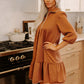 Cozy rust-colored ruffled hem zip front texture dress with tiered hemline