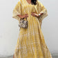 Flowing yellow and cream tie-dye V-neck maxi kaftan dress with loose sleeves