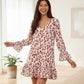 Women’s pink and burgundy leopard print short-sleeved dress with V-neck and ruffle cuffs