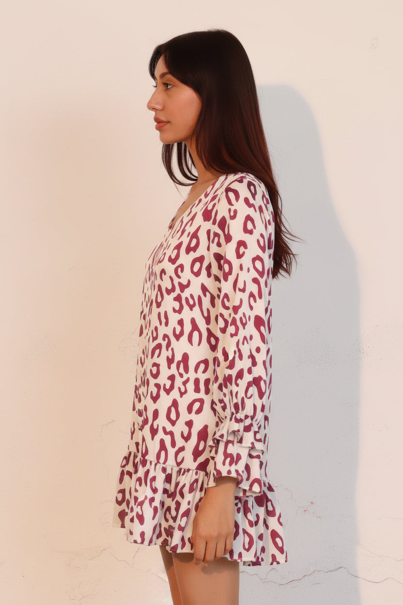 Women’s white and burgundy leopard-print blouse with ruffle cuffs