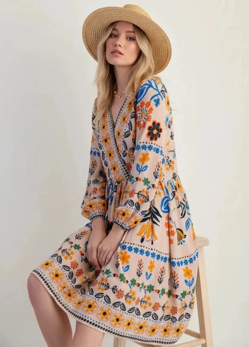 Bohemian floral print long sleeve mini dress in off-white with orange blue green patterns