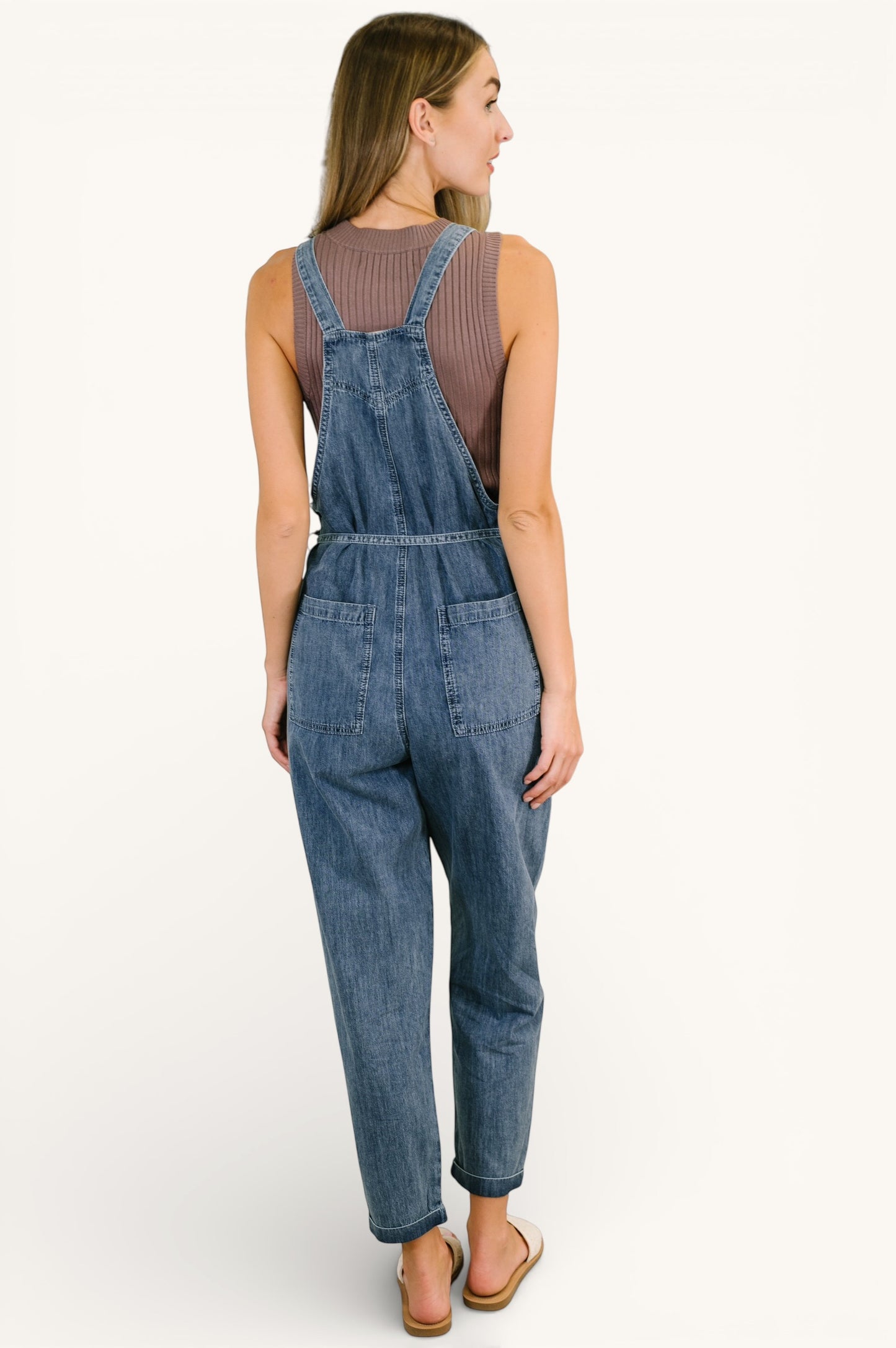 Too Cute to Compute dark blue waist tie overalls with mauve top, rolled cuffs