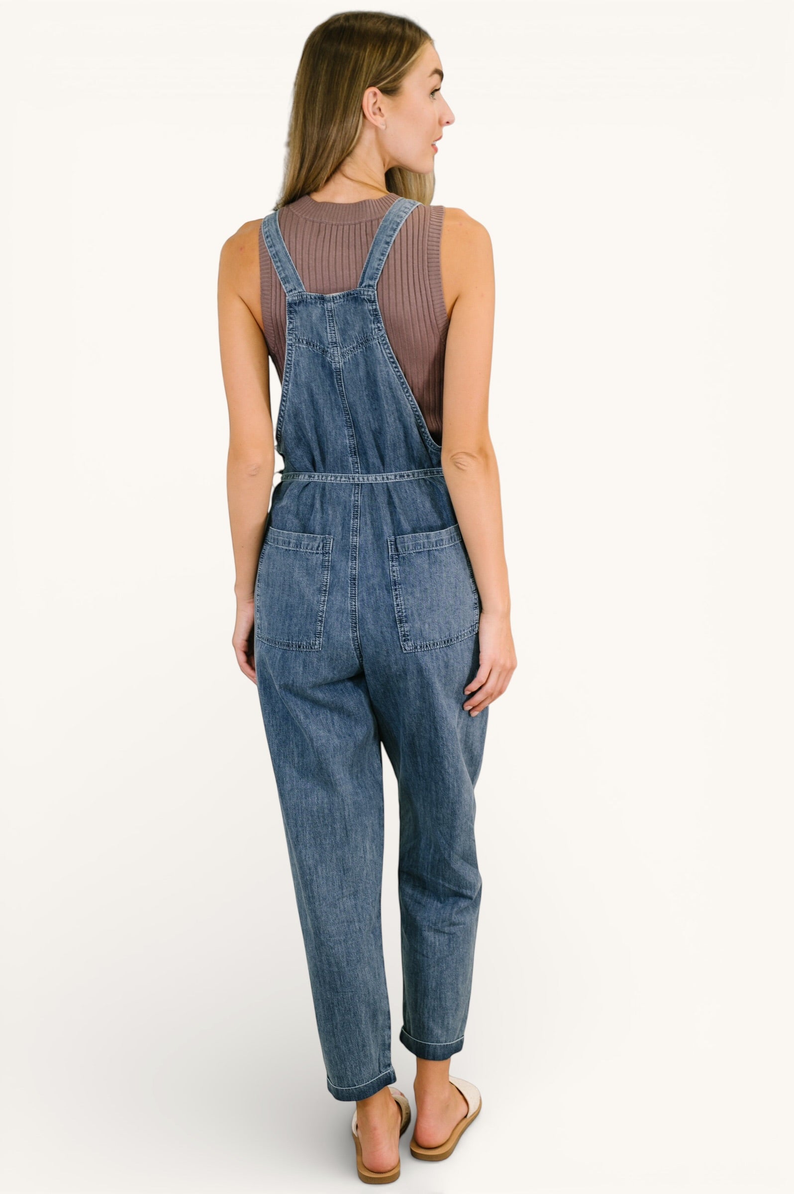 Too Cute to Compute dark blue waist tie overalls with mauve top, rolled cuffs