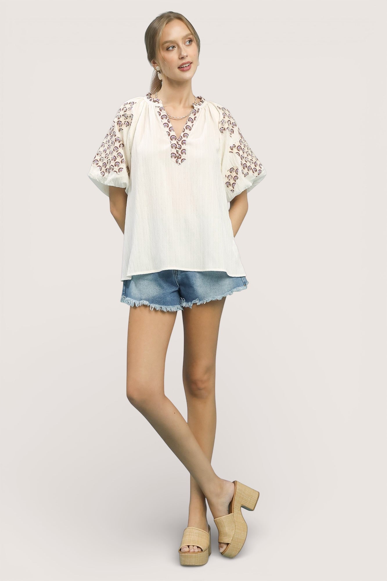 Umgee embroidered sleeve contrast trim top with white floral blouse