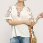 Umgee embroidered sleeve contrast trim top with white blouse and brown patterns