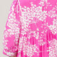 Umgee floral babydoll dress with pockets: vibrant pink peony pattern, white prints, puffed sleeves
