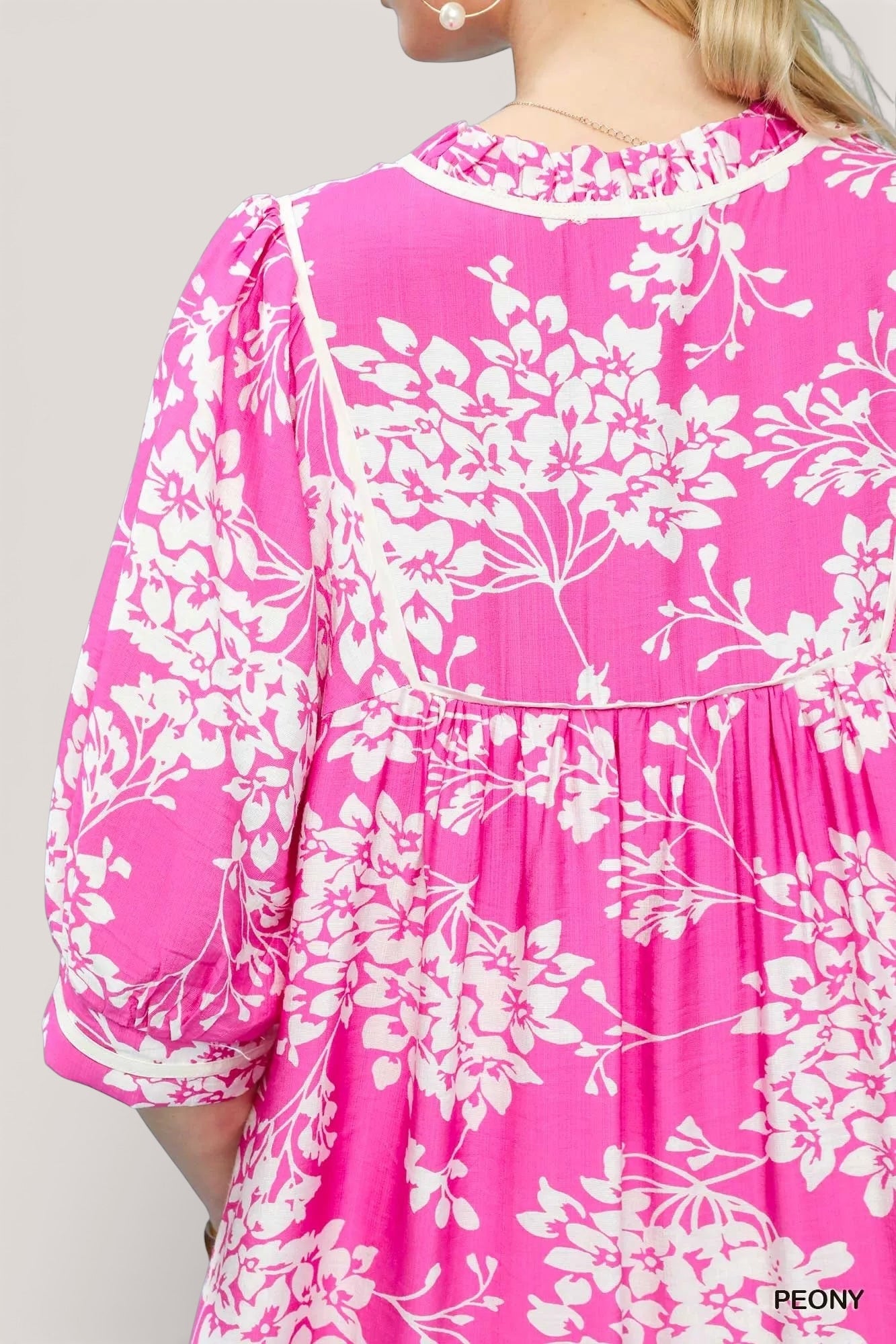 Umgee floral babydoll dress with pockets: vibrant pink peony pattern, white prints, puffed sleeves