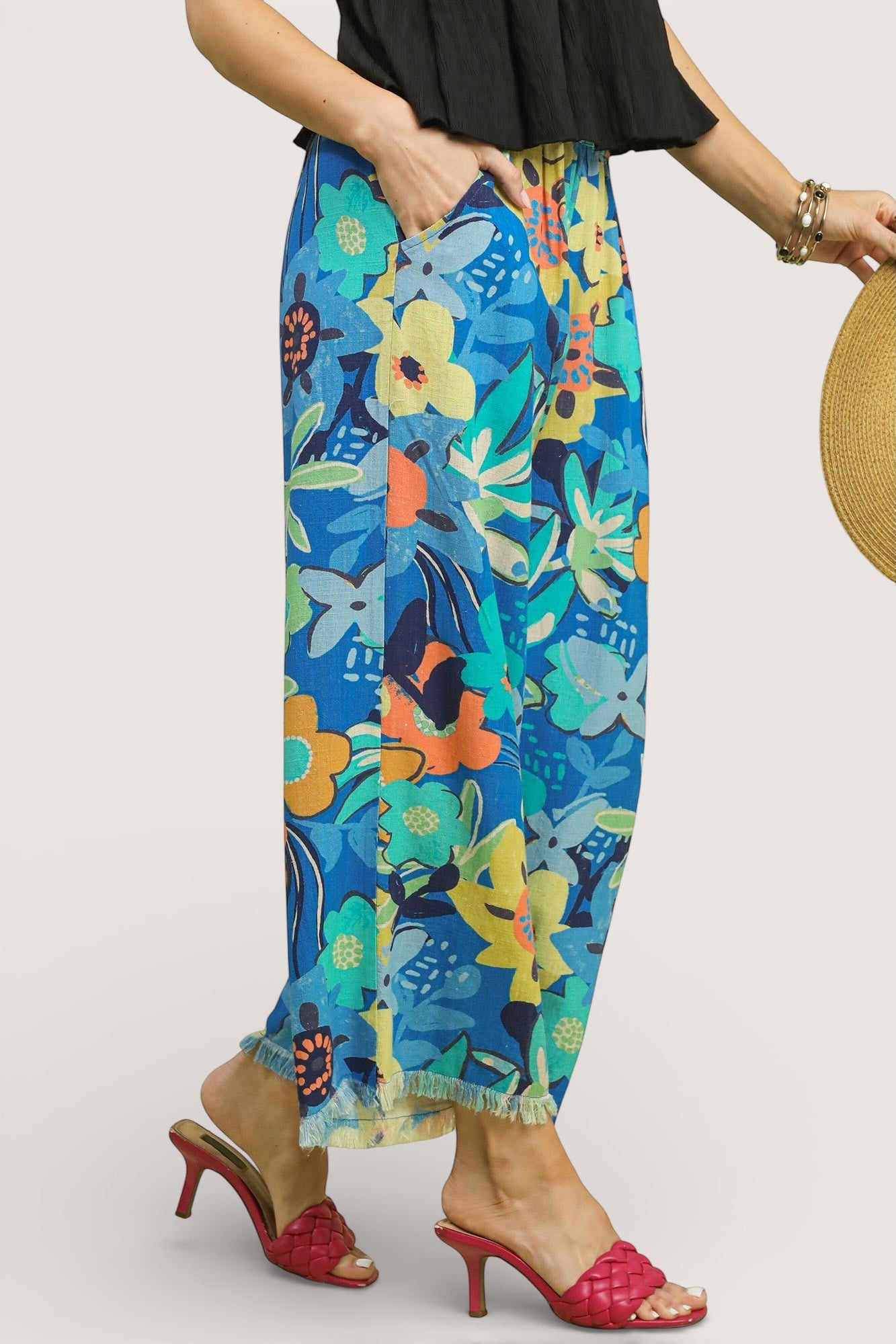 Blue floral print Umgee wide-leg pants with frayed hem