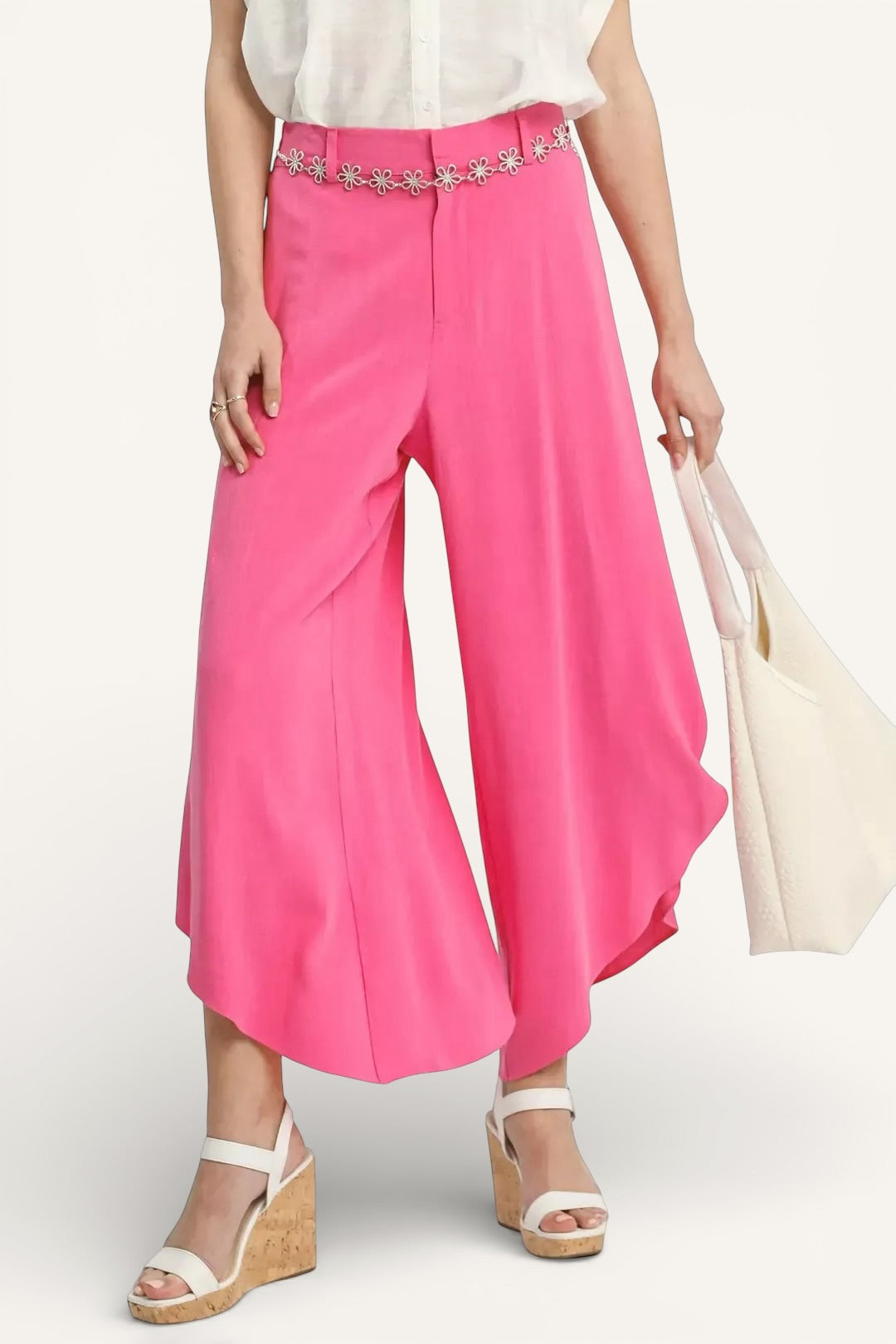 Umgee Flowy asymmetrical hem wide-leg pants in bright pink with silver beaded belt