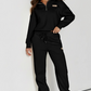 Daverri black zip-neck sweatshirt with beige chest patch, front view