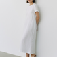 Minimalist white linen midi dress with short sleeves in Braided Strappy Sandal