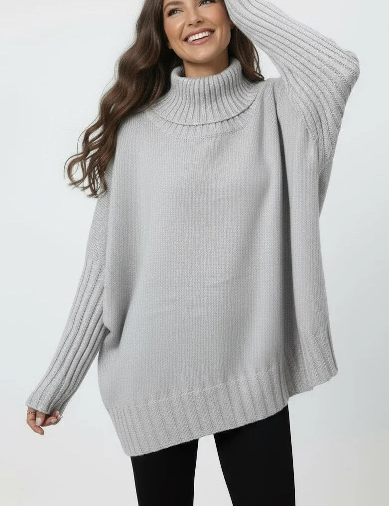 Light gray oversized turtleneck sweater with ribbed detailing