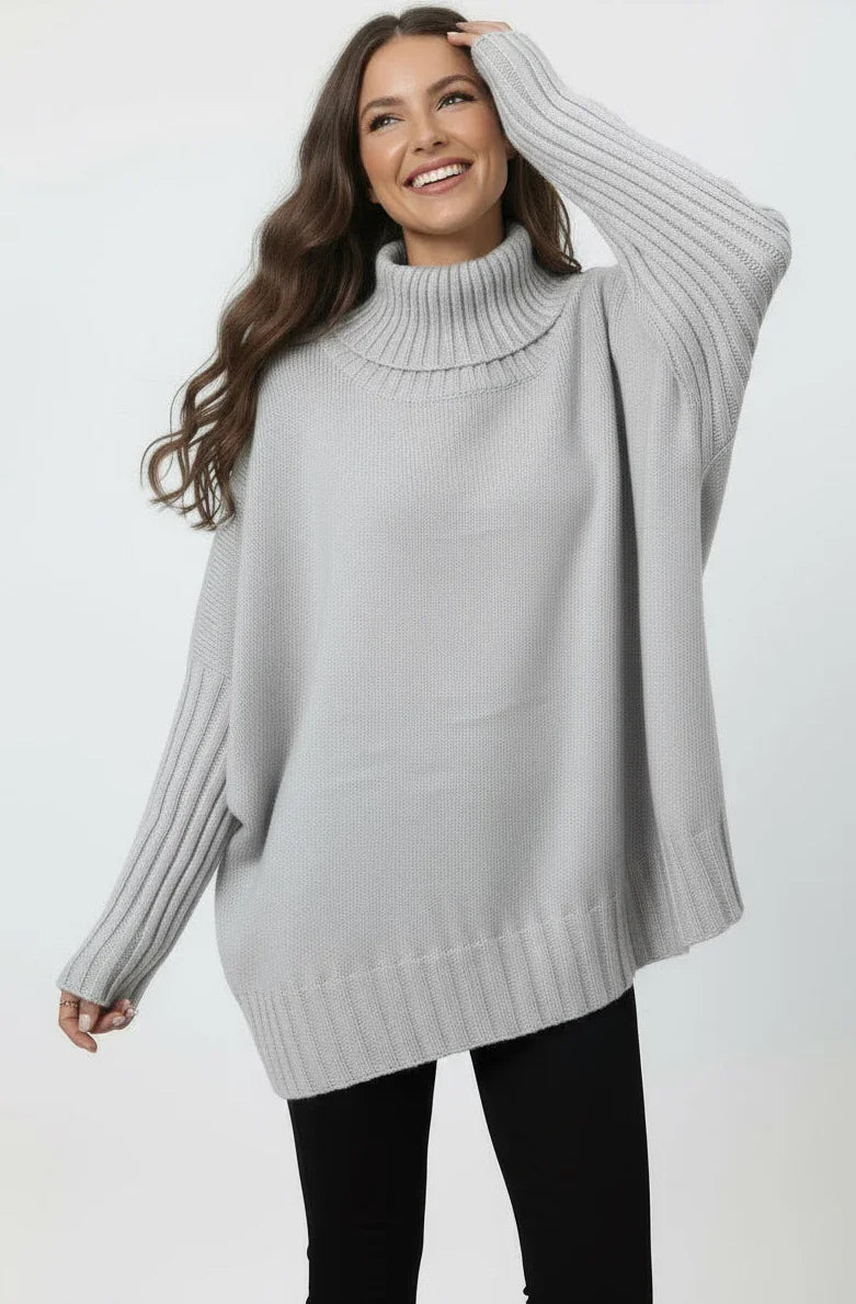 Light gray oversized turtleneck sweater with ribbed detailing