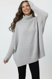 Light gray oversized turtleneck sweater with ribbed detailing