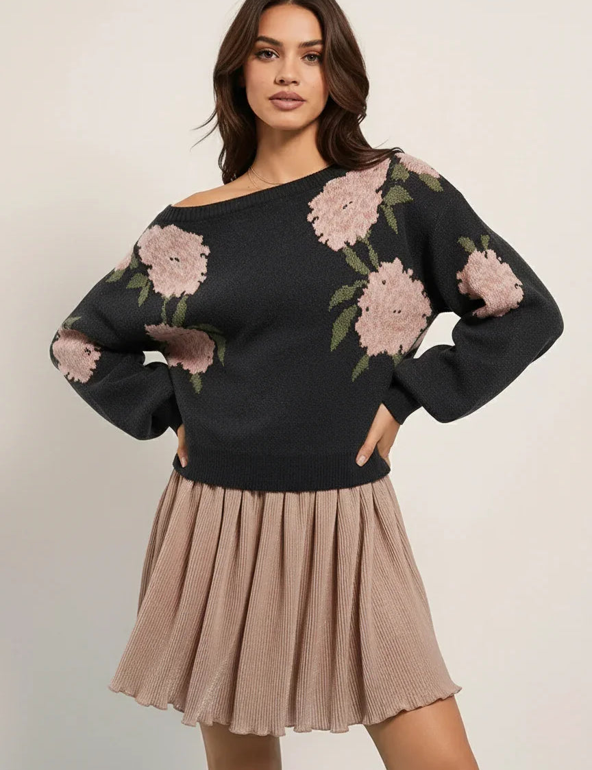 Black floral embroidered boat neck long sleeve sweater with beige pleated skirt