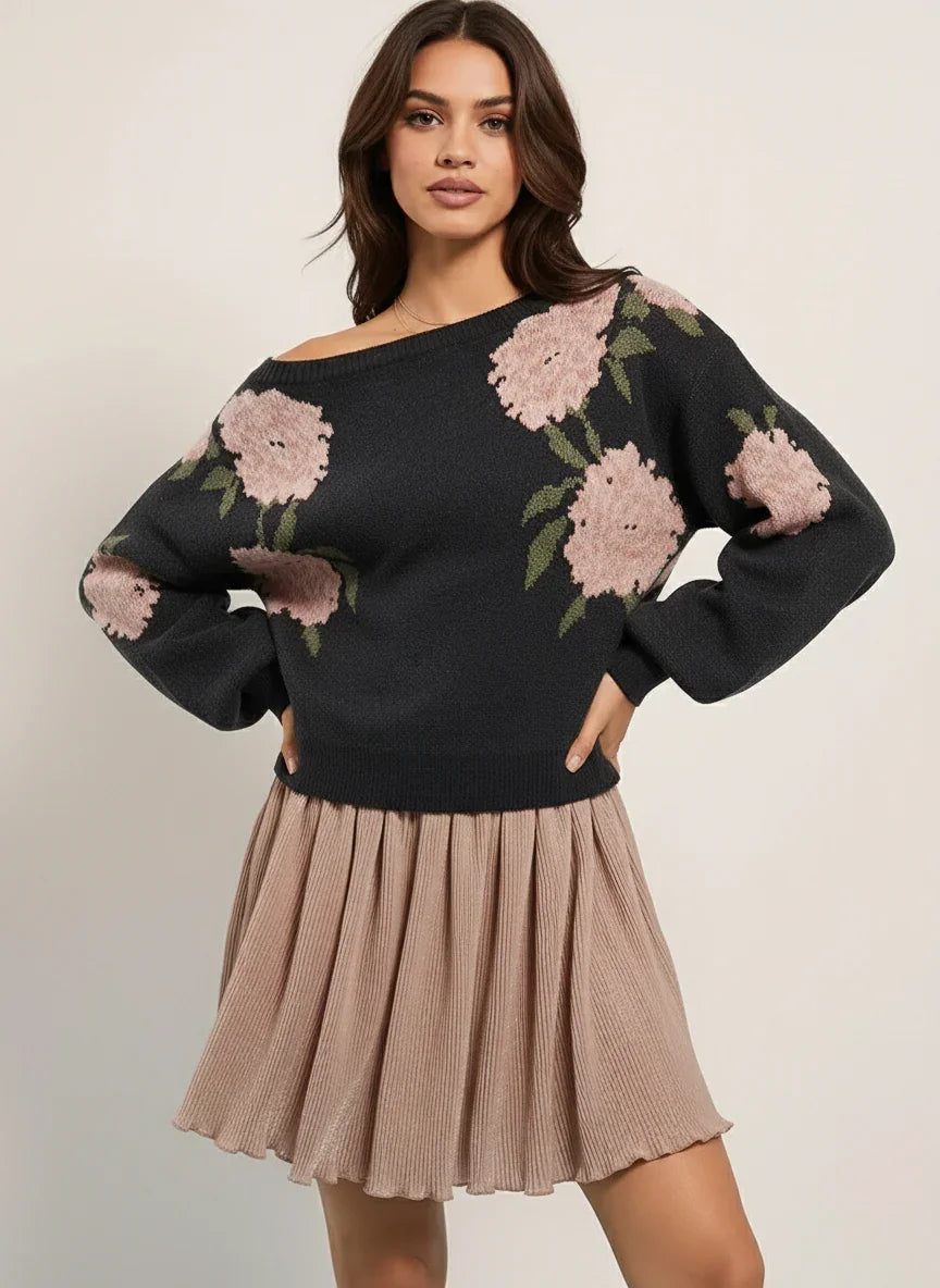 Black floral embroidered boat neck long sleeve sweater with beige pleated skirt