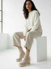 Cream-colored chunky heel suede platform sock bootie