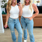 Isla Mid Rise Distressed Released Hem Bootcut Jeans Womens