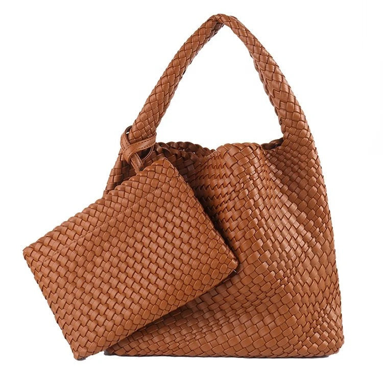 Caramel colored woven vegan leather hobo handbag with a vegan leather cosmetic bag